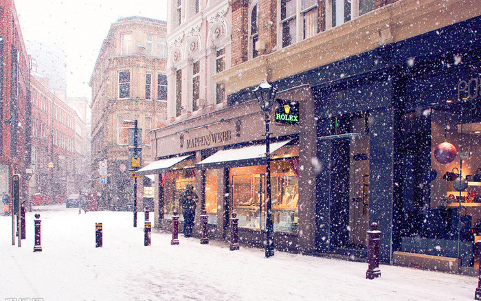 大熊猫雪地打滚 快让我在雪地里撒点儿野！